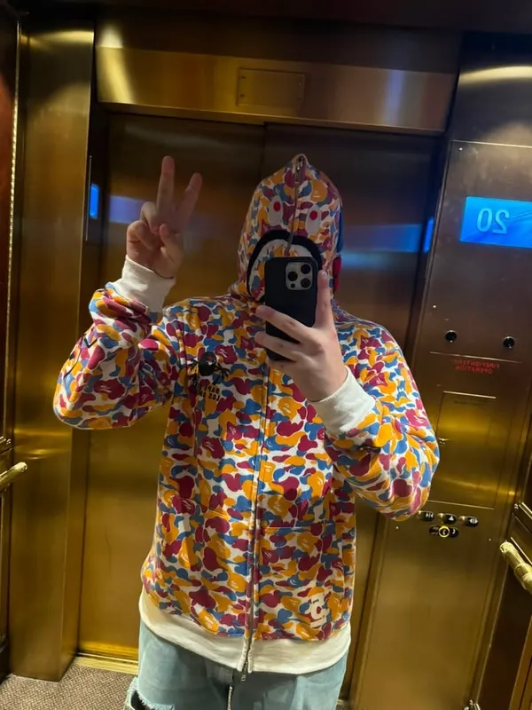 Gold elevator, camo hood
