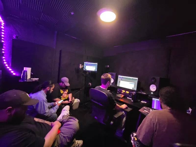 Quarter to seven — inside at Purple Sound, chairs pulled up
