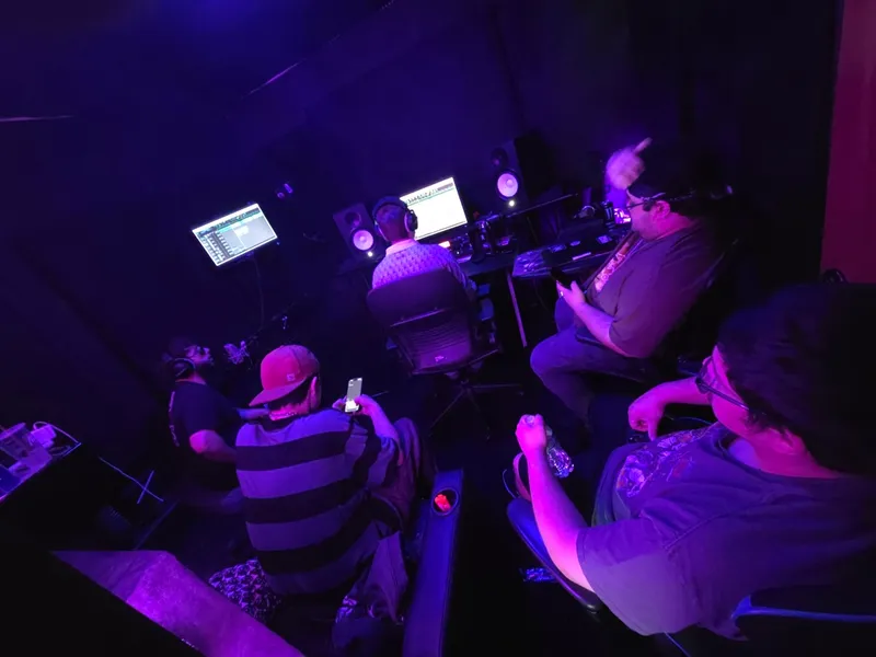 Over the shoulder at the session, monitors going