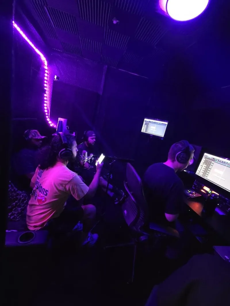 Deep in the plugin windows — beat work on the laptop with the big screen above