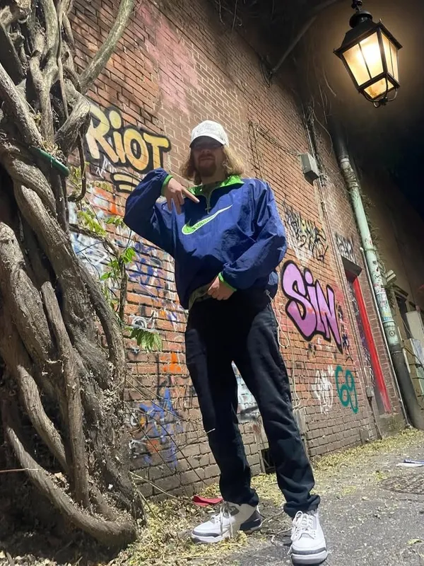 In the alley, RIOT on the wall