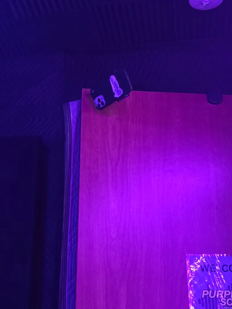 The booth wall, empty for a moment
