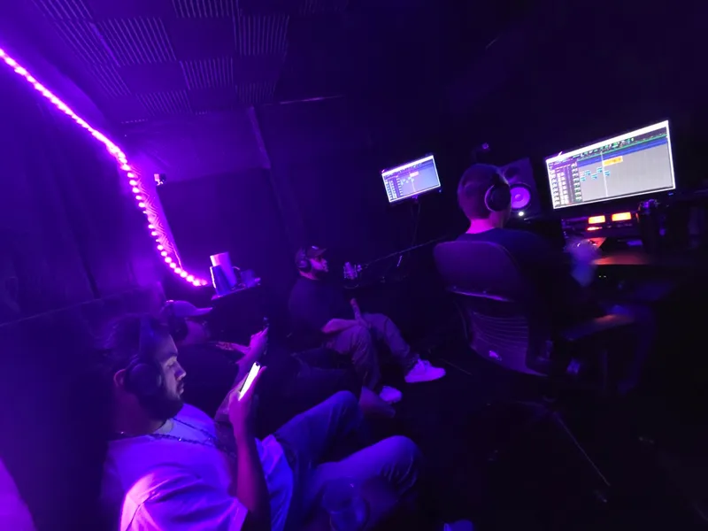 The session running long, the room still in
