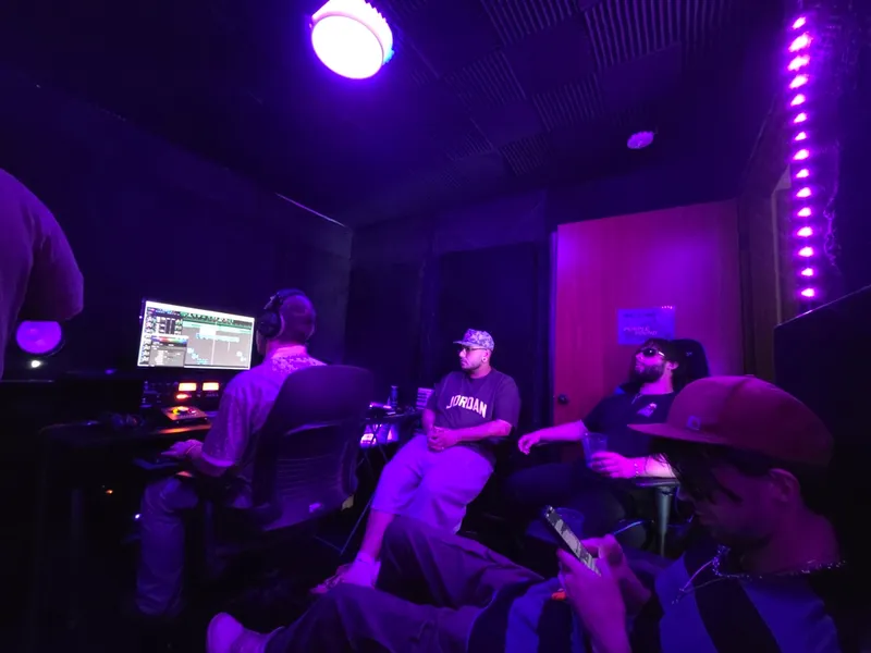 Late afternoon — the mix starts, everyone still in the room
