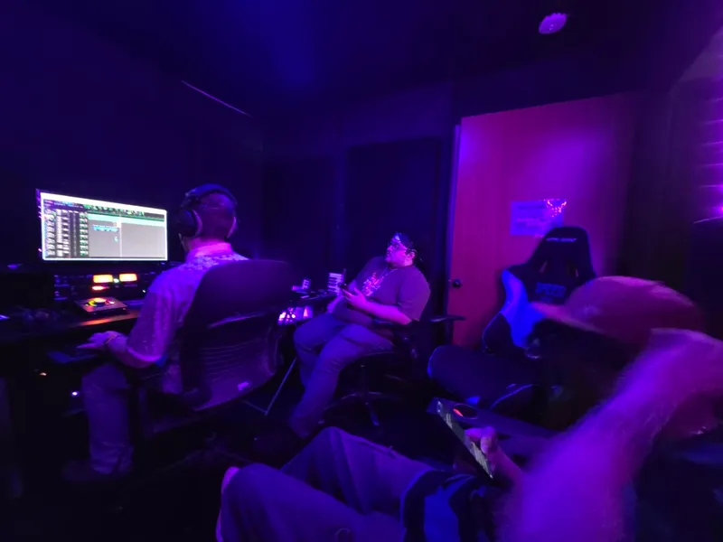 The room listening back against the wood wall