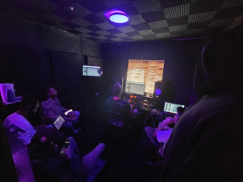 Watching the session from the back of the room